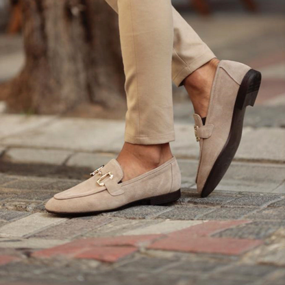 Men's beige horsebit loafers with classic slip-on design for smart casual and formal occasions