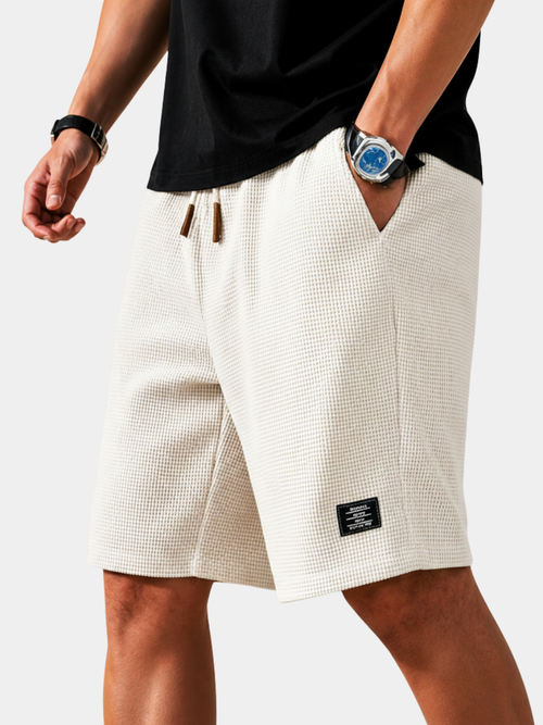 Men's beige lightweight summer shorts with regular fit and elasticated waist for casual warm-weather style