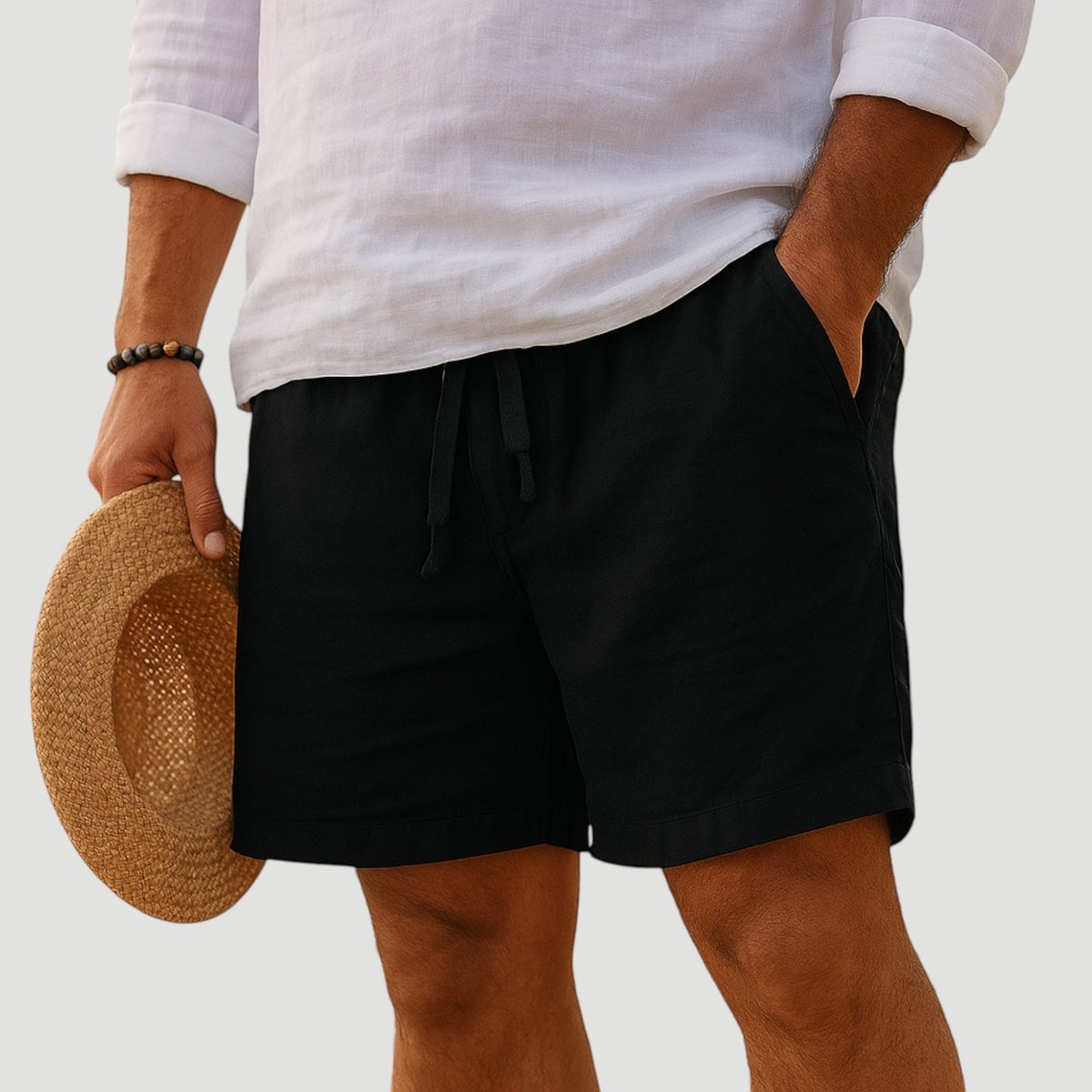 Men's black cotton-linen shorts with lightweight fabric and relaxed tailored fit