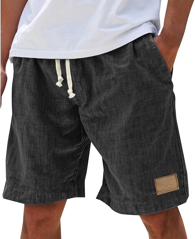 Men's black cotton shorts with relaxed fit, elasticated drawstring waist and side pockets