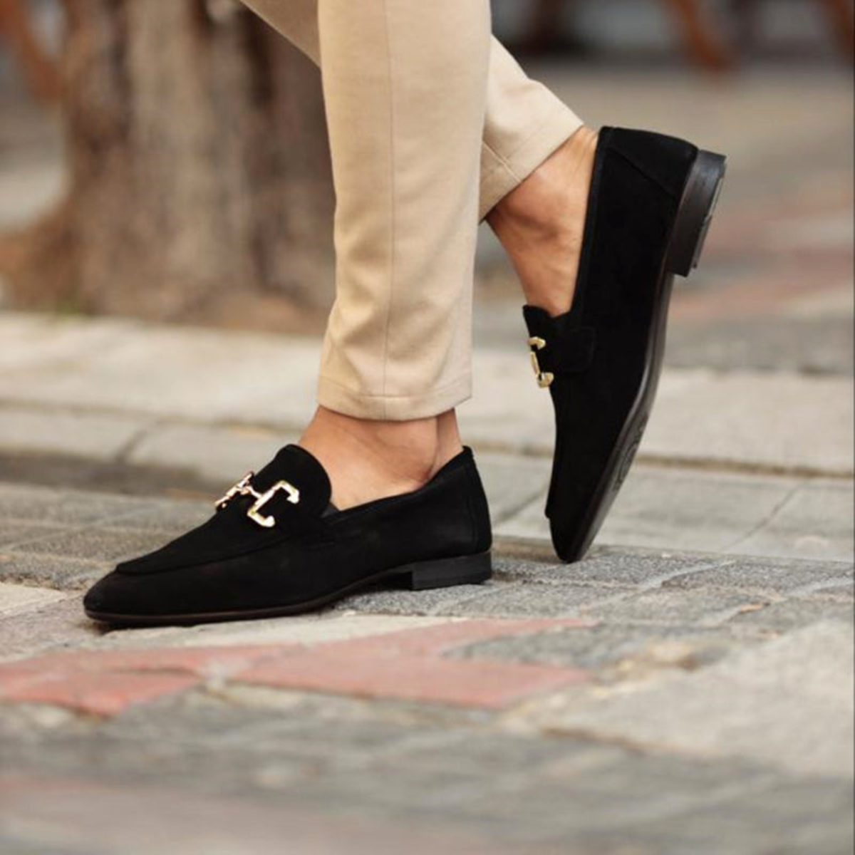 Men's black horsebit loafers with classic slip-on design for smart casual and formal occasions