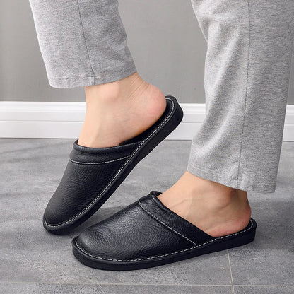 Men's black leather slippers with lightweight design for indoor and outdoor comfort