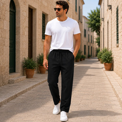 Men's black linen pants with lightweight fabric, relaxed fit and straight-leg design