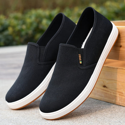 Men's black slip-on loafers with breathable fabric upper, elasticated side panels and non-slip sole