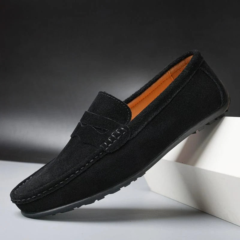 Men's black synthetic strap loafers with classic top band and low-profile design