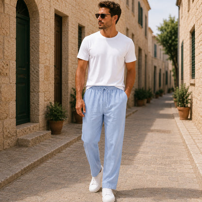 Men's blue linen pants with lightweight fabric, relaxed fit and straight-leg design