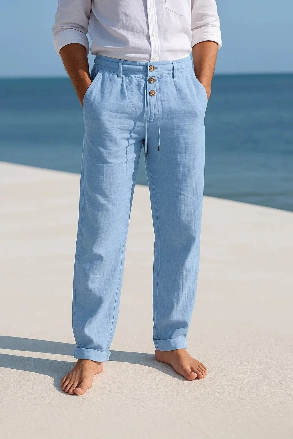 Men's blue linen pants with lightweight relaxed fit for coastal days and summer holidays