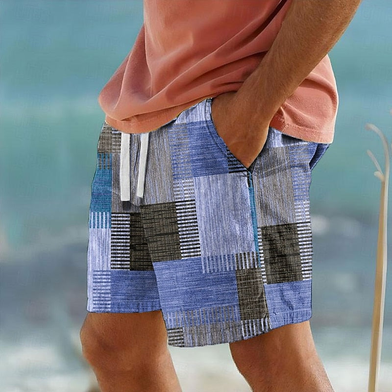 Men's blue patchwork swim shorts with relaxed fit and adjustable drawstring