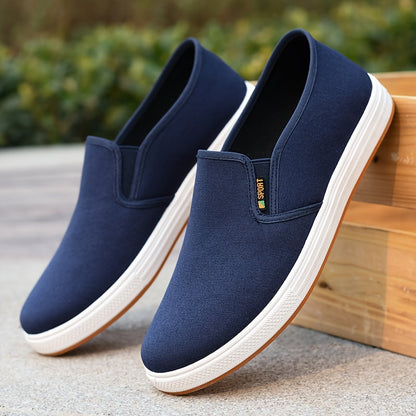 Men's blue slip-on loafers with breathable fabric upper, elasticated side panels and non-slip sole