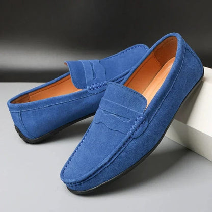 Men's blue synthetic strap loafers with classic top band and low-profile design