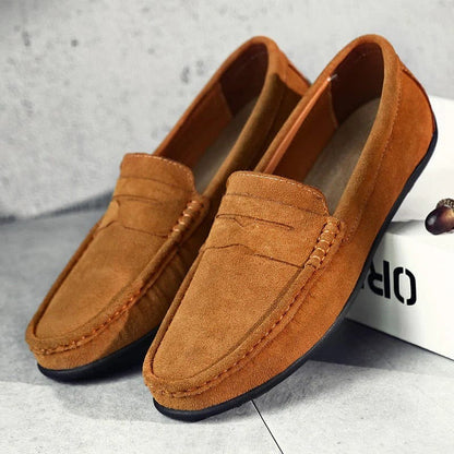 Men's brown synthetic strap loafers with classic top band and low-profile design