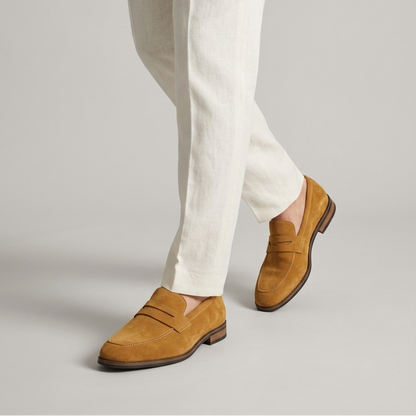 Men's camel synthetic loafers with classic strap detail and slip-on design for refined smart casual outfits
