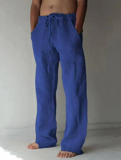 Men's dark blue linen drawstring trousers with relaxed wide leg fit and elasticated waistband
