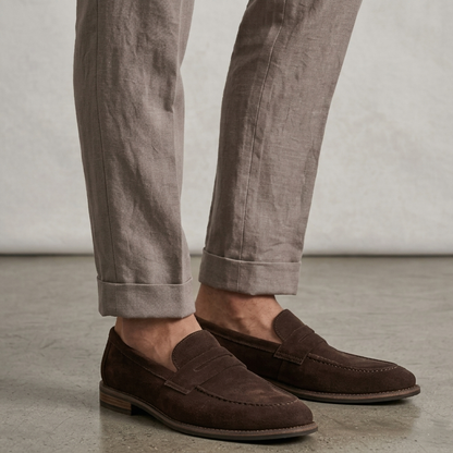 Men's dark brown synthetic loafers with classic strap detail and slip-on design for smart casual style