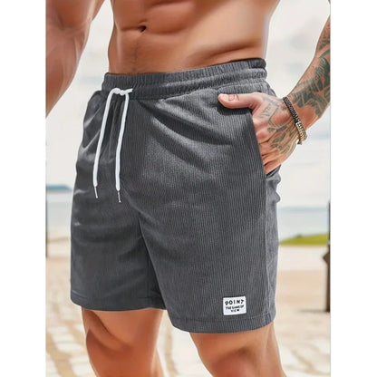 Men's dark grey drawstring summer shorts with relaxed fit and practical pockets