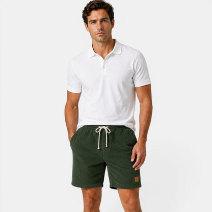 Men's dark green corduroy shorts with soft lightweight texture for relaxed everyday summer outfits