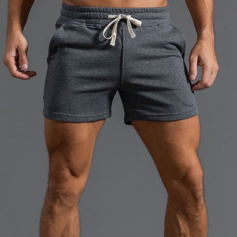 Men's dark grey cotton beach shorts with modern fit and elasticated waistband