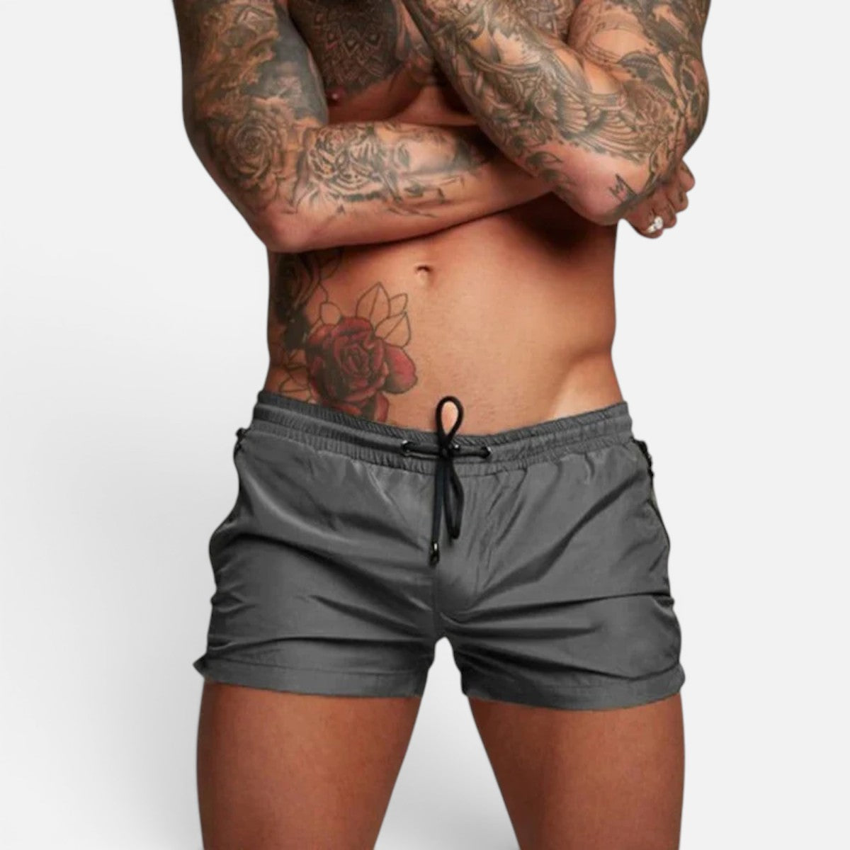 Men's dark grey stretch swim trunks with quick-dry design and adjustable drawstring waist