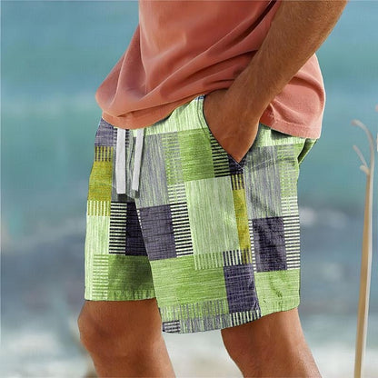 Men's green patchwork swim shorts with relaxed fit and adjustable drawstring