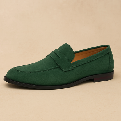 Men's green penny loafers with classic slip-on design for smart casual style