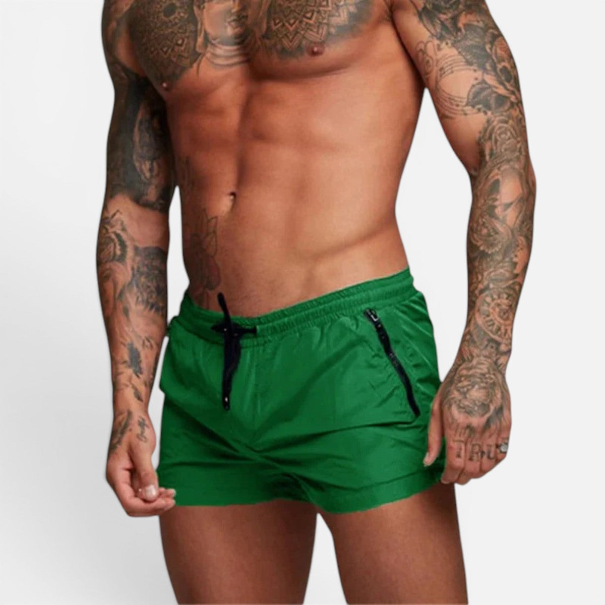 Men's green stretch swim trunks with quick-dry design and adjustable drawstring waist