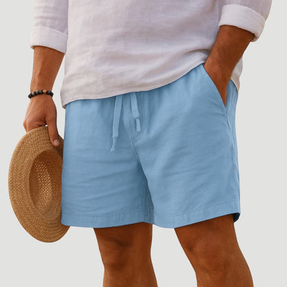 Men's light blue cotton-linen shorts with lightweight fabric and relaxed tailored fit