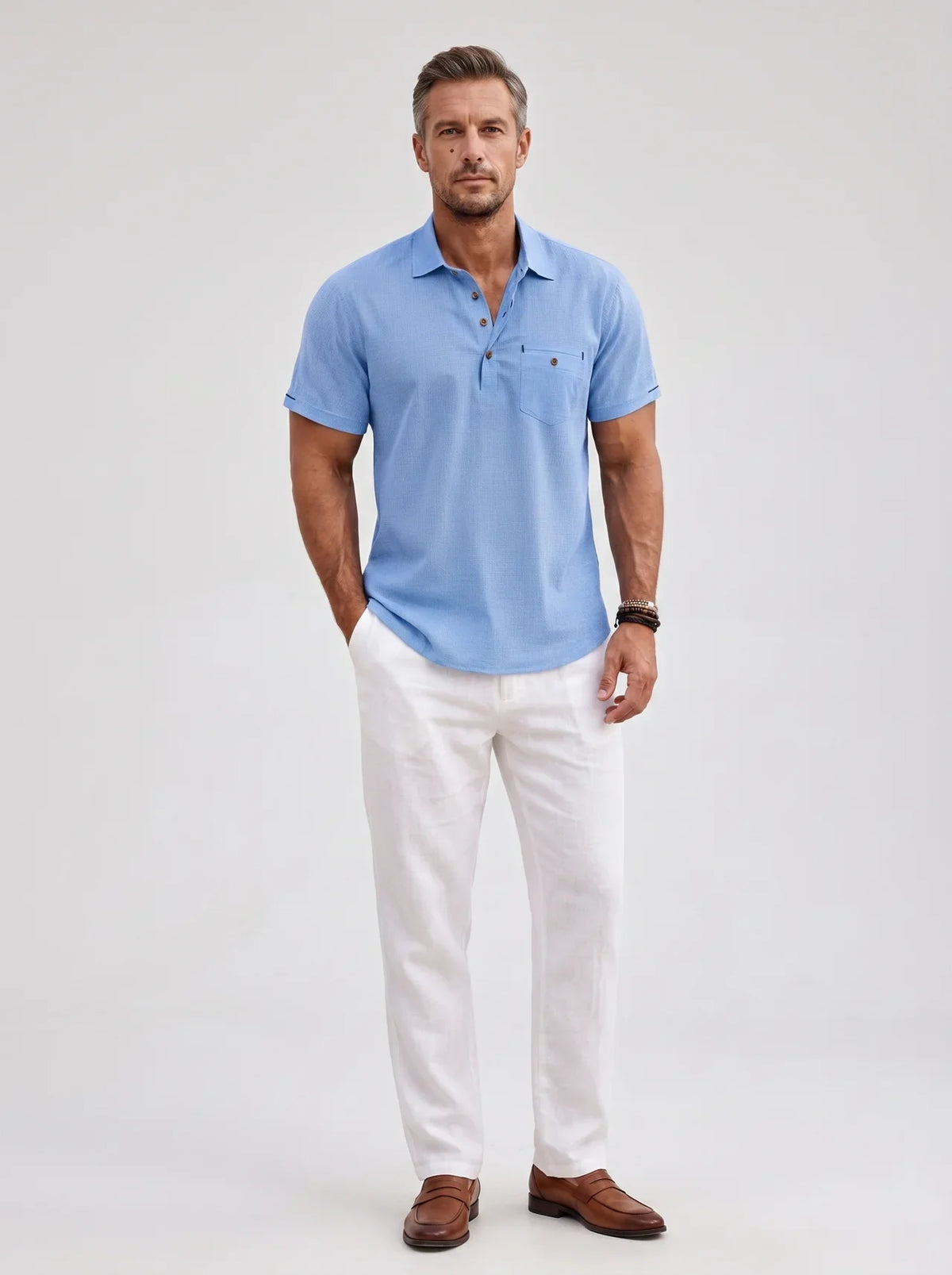 Men's light blue linen polo shirt with short sleeves and relaxed fit for summer style