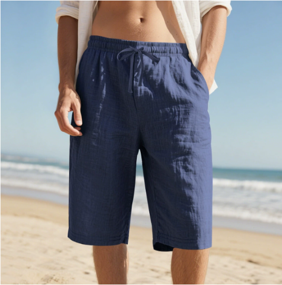 Men's navy blue relaxed fit beach shorts with elasticated waist and adjustable cord for versatile summer wear