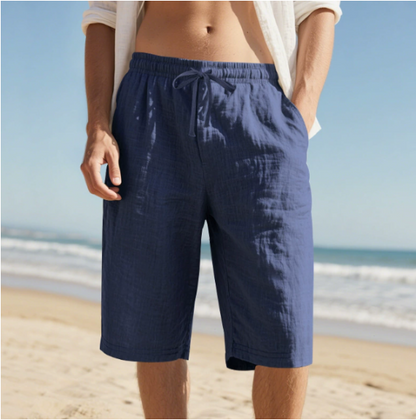 Men's navy blue relaxed fit beach shorts with elasticated waist and adjustable cord for versatile summer wear