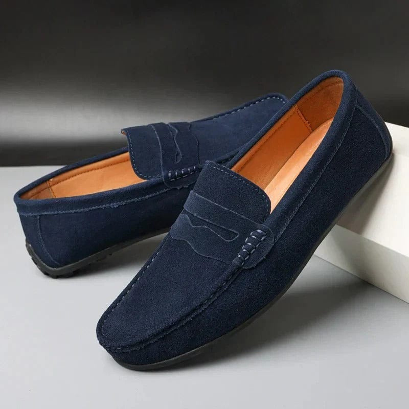Men's navy blue synthetic strap loafers with classic top band and low-profile design