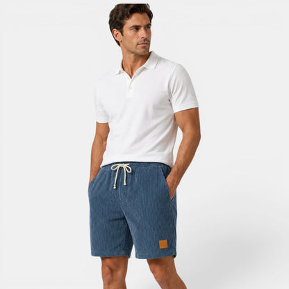 Men's navy corduroy shorts with lightweight textured fabric for versatile summer casual wear
