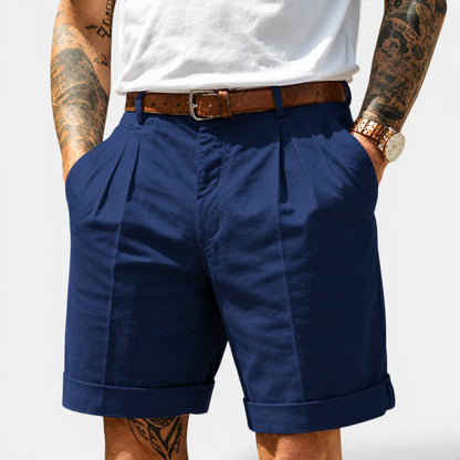 Men's navy linen shorts with a relaxed fit for versatile holiday, coastal and everyday summer outfits