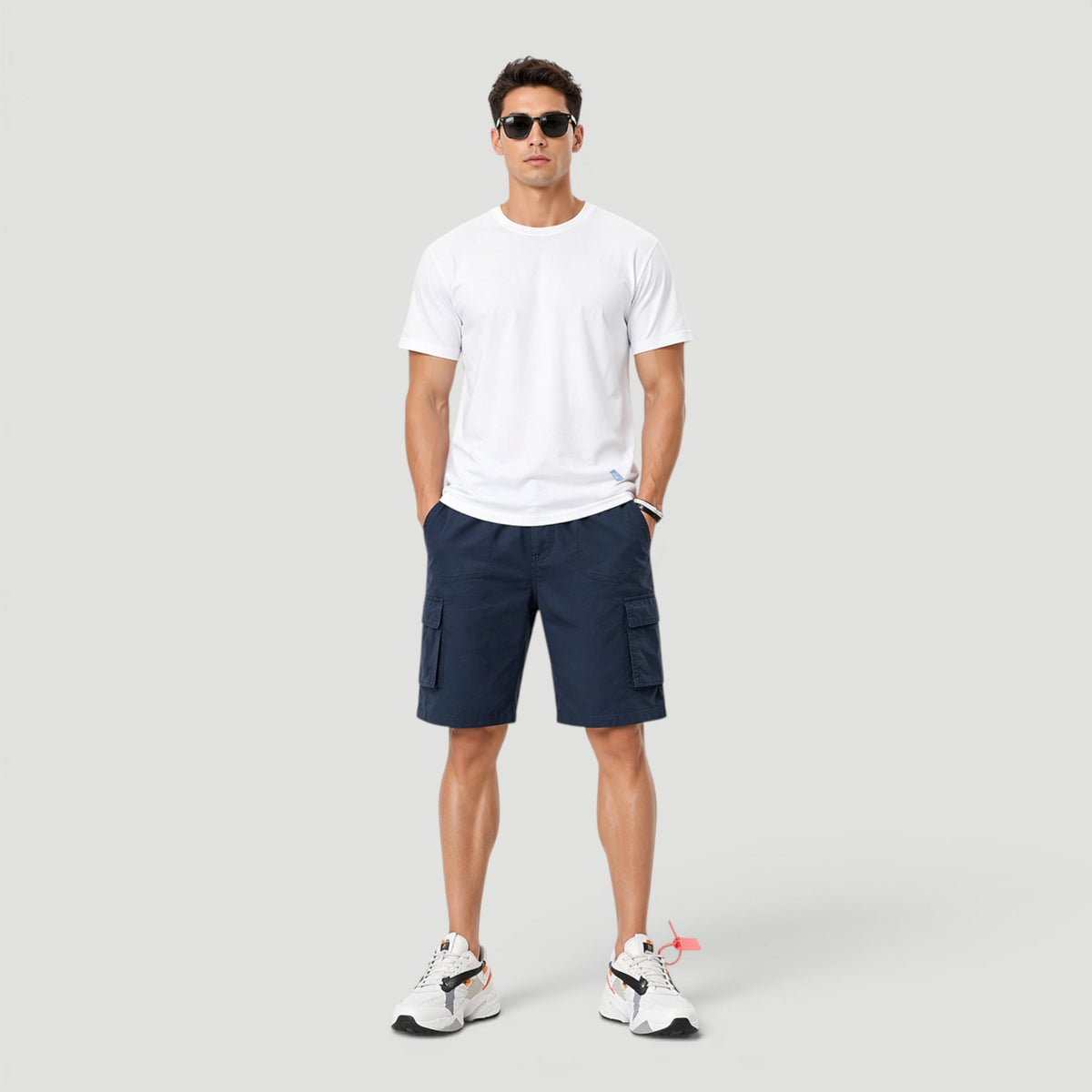 Men's navy polyester cargo shorts with adjustable drawstring waist and multiple pockets