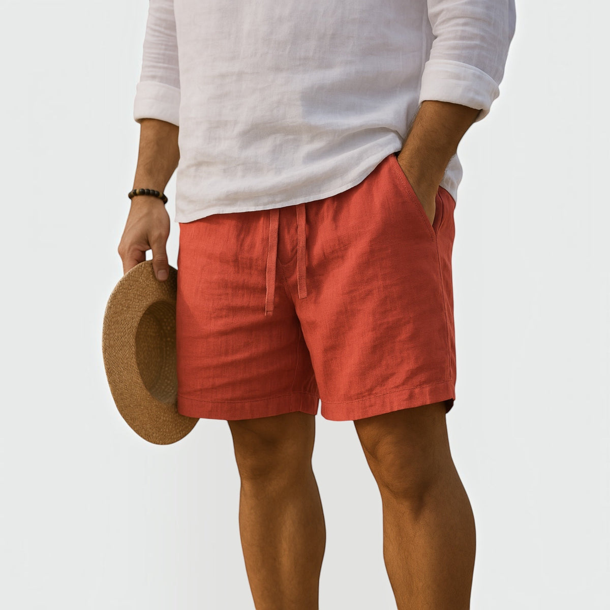 Men's orange cotton-linen shorts with lightweight fabric and relaxed tailored fit