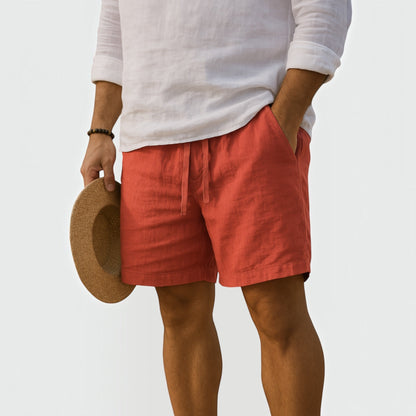 Men's orange cotton-linen shorts with lightweight fabric and relaxed tailored fit