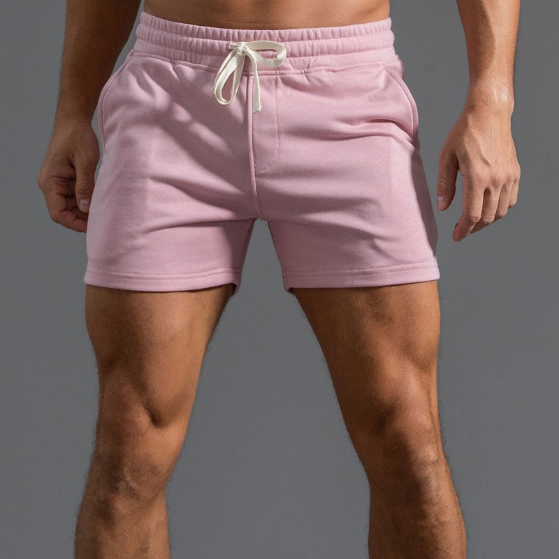 Men's pink cotton beach shorts with modern fit and elasticated waistband