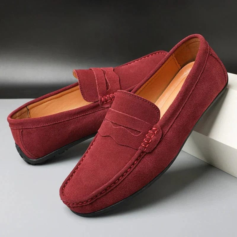 Men's red synthetic strap loafers with classic top band and low-profile design
