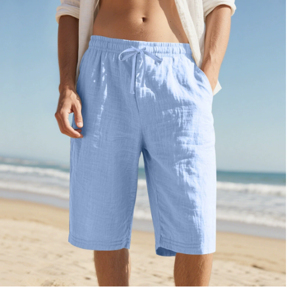Men's sky blue relaxed fit beach shorts with elasticated waist and adjustable cord for relaxed summer style