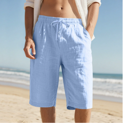 Men's sky blue relaxed fit beach shorts with elasticated waist and adjustable cord for relaxed summer style