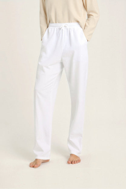 Men's white cotton linen beach pants with lightweight fabric and relaxed casual style
