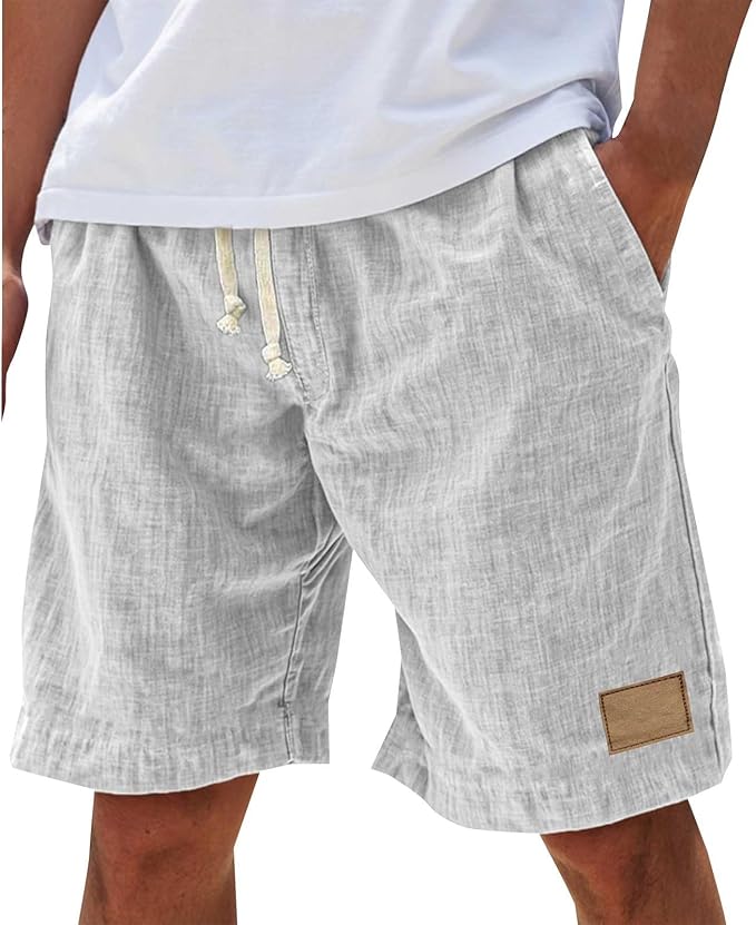 Men's white cotton shorts with relaxed fit, elasticated drawstring waist and side pockets