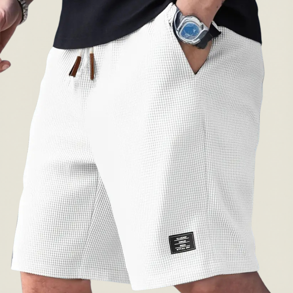 Men's white lightweight summer shorts with regular fit and elasticated waist for holidays and warm-weather style