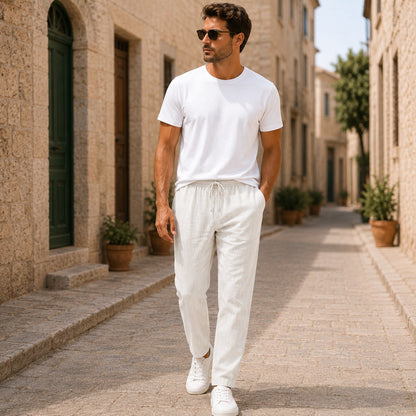 Men's white linen pants with lightweight fabric, relaxed fit and straight-leg design