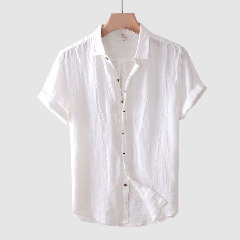 Men's white linen shirt with short sleeves, relaxed fit and crinkle textured finish